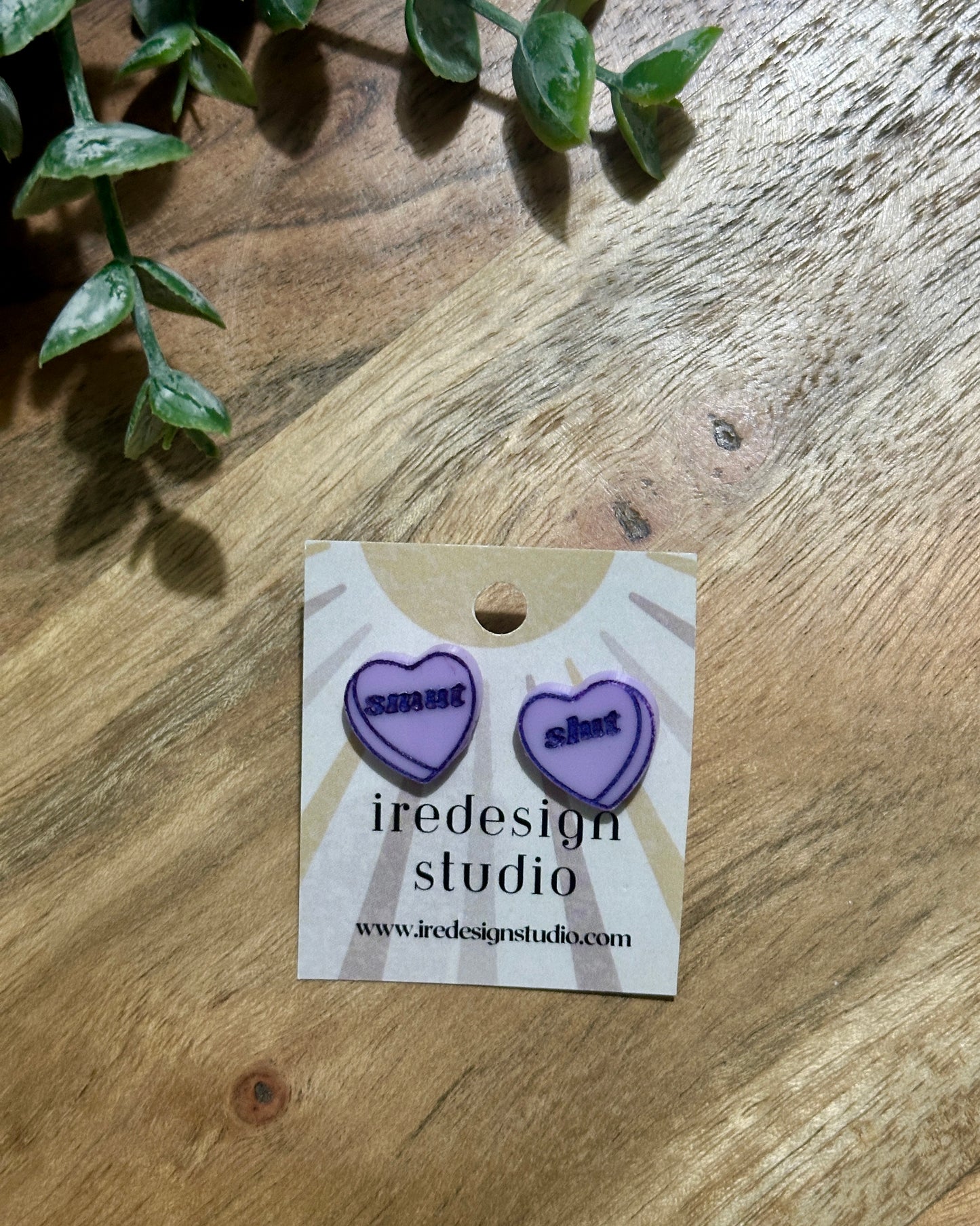 smut slut stud earrings